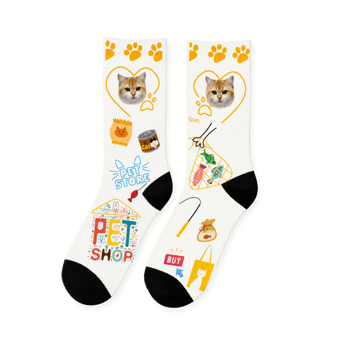 White crew socks laid flat, printed with a cat's face inside a yellow drawn heart above illustrated pet shop items